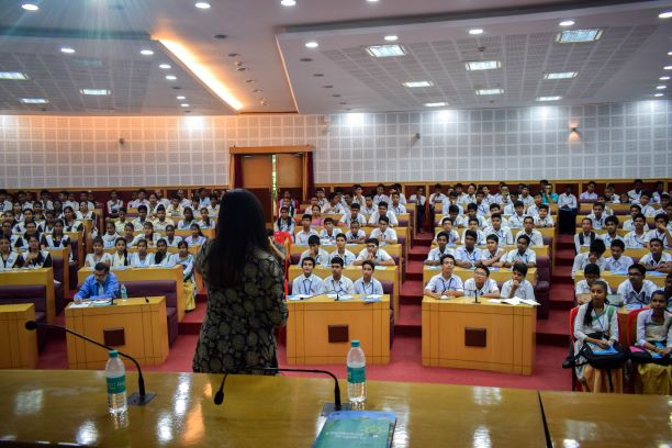 The resource person deliberating to the students